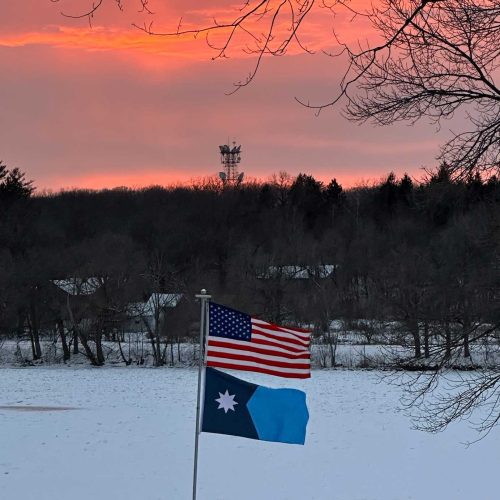 New Minnesota state Flag outdoor sunset